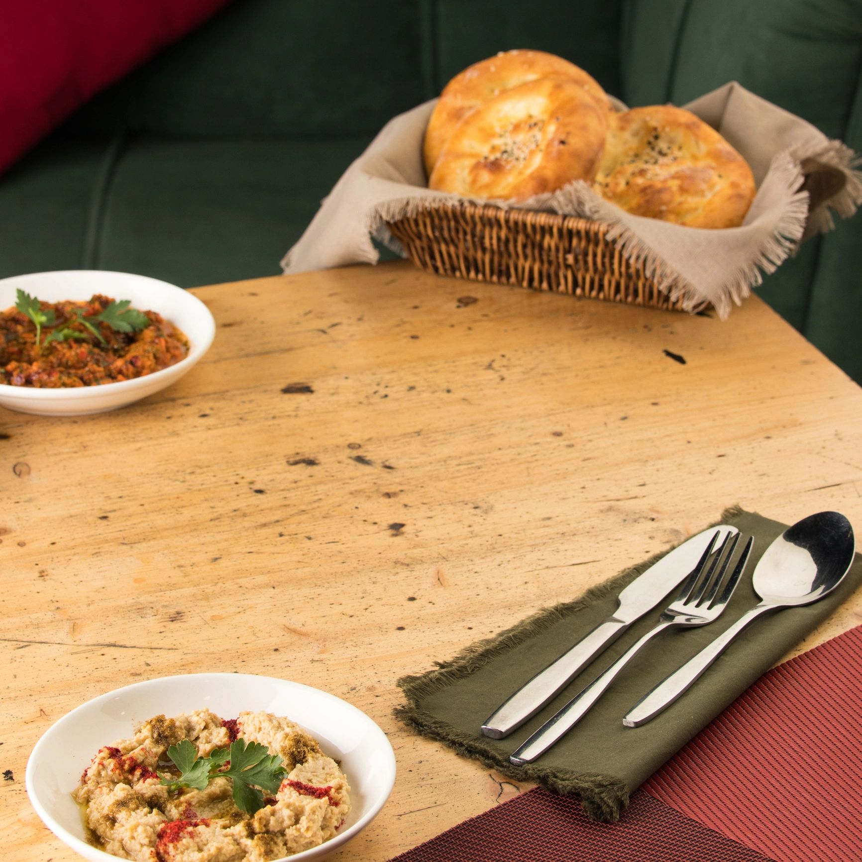 Appetizers and bread on a wooden table