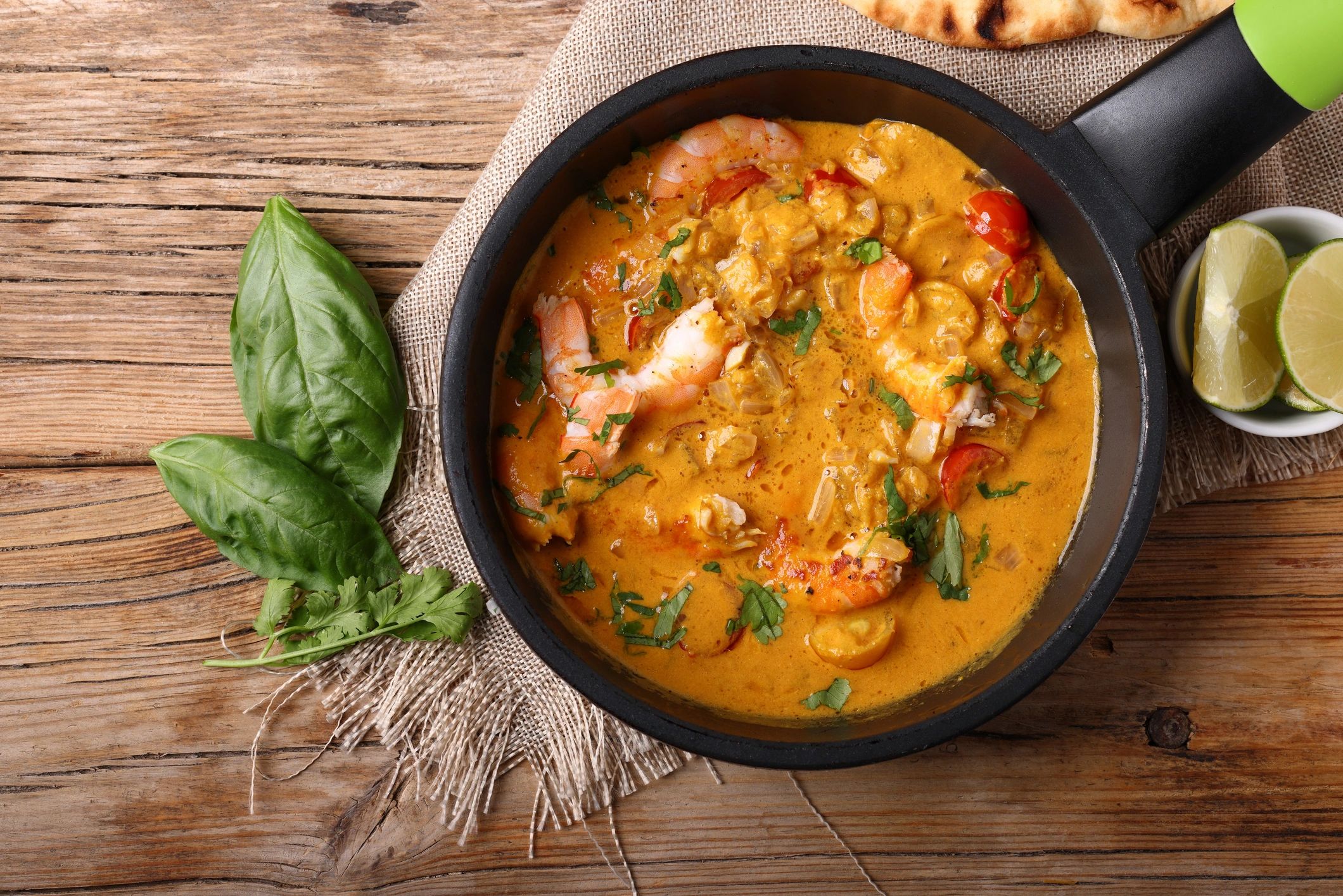 Indian curry served with basmati rice on a restaurant table
